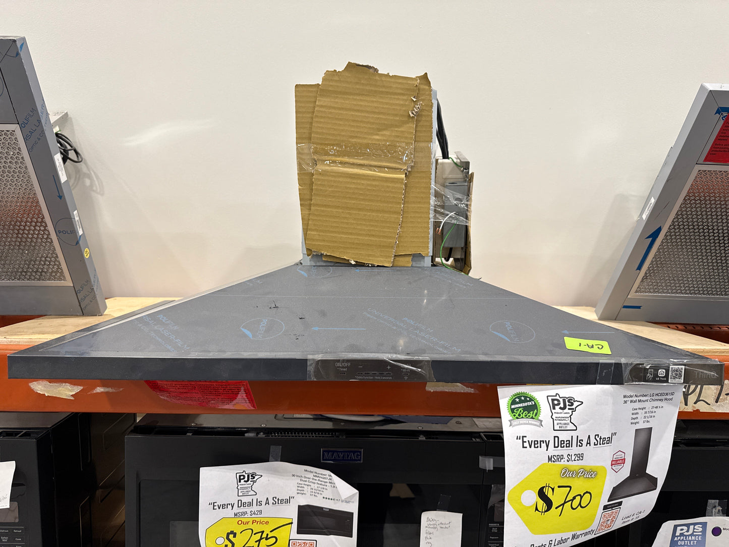 LG HCED3615D 36 Inch Wall Mount Range Hood with 5 Speed 600 CFM Internal Blower, Dishwasher Safe Mesh Filters, Dual Level LED Lighting, and RoHS Compliant: Black Stainless Steel